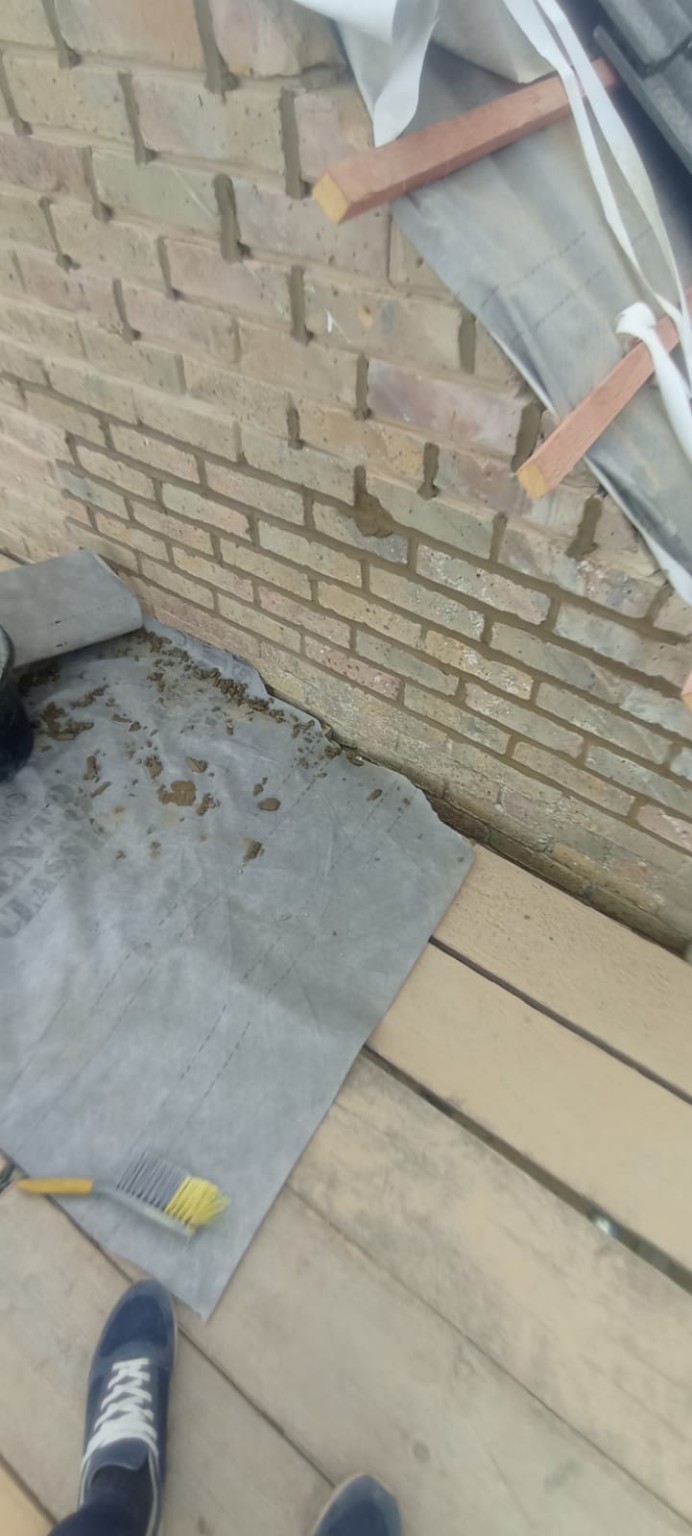 Brick parapet wall repointing in Tadley, Hampshire