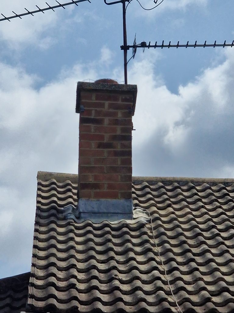 Chimney with lead flashing in Hampshire