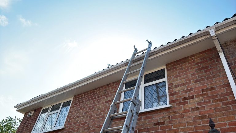 Gutter and downpipe on a brick house in Hampshire